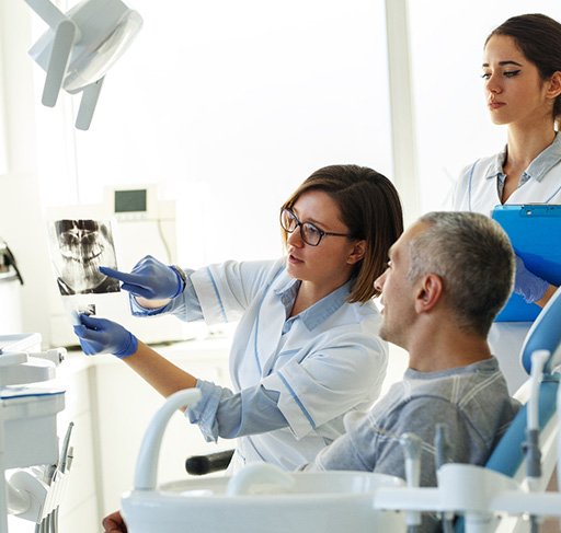 Morristown patient learning importance of cleanings 