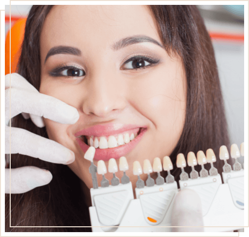 Young woman trying on dental veneers