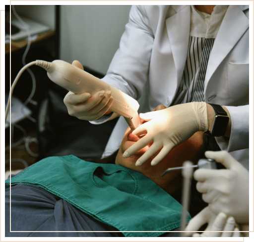 Dentist capturing digital impressions of teeth