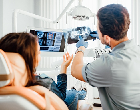 Patient reviewing X-ray with patient