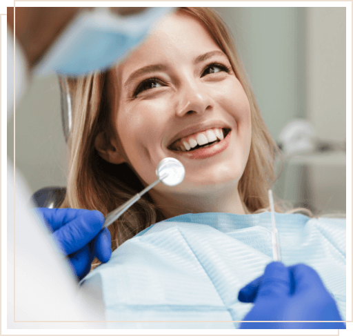 Woman smiling at her dentist during dental checkup