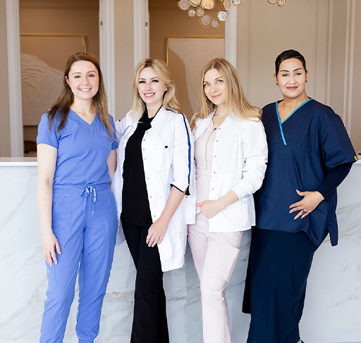 Morristown dental team members dressed in tooth fairy or superhero costumes